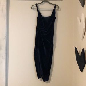 Beautiful dark blue elegant suede materiallong dress with open slit in the front